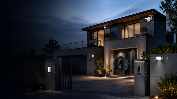 Modern luxury home protected by smart security cameras, video doorbell, smart lock, motion floodlight and alarm sensors